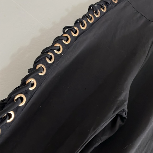 Sexy black jumpsuit with grommets down legs - Picture 5 of 7